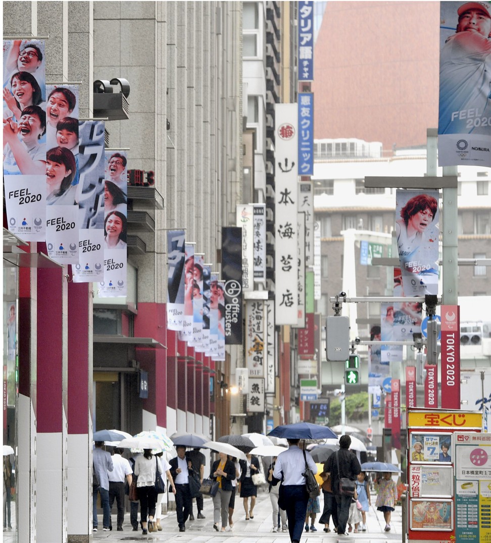 Promotional Olympic Games banners already in place in Tokyo’s Nihombashi district. Photo: Kyodo