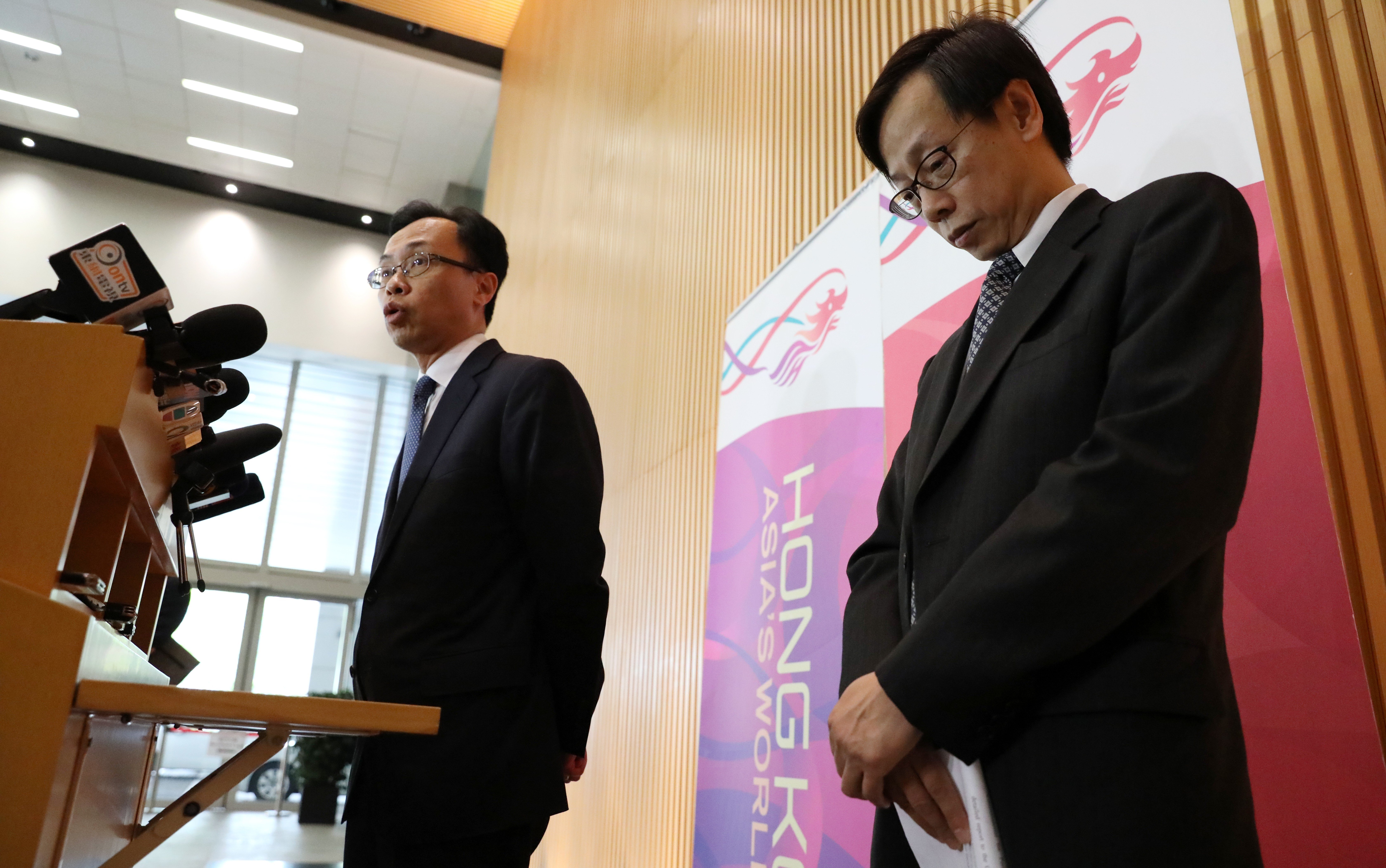 (Left to right) Secretary for Constitutional and Mainland Affairs Patrick Nip and Wong See-man, who was in charge of the Registration and Electoral Office (REO) at a press conference in April, where Wong denied knowing about the missing data. Photo: Nora Tam