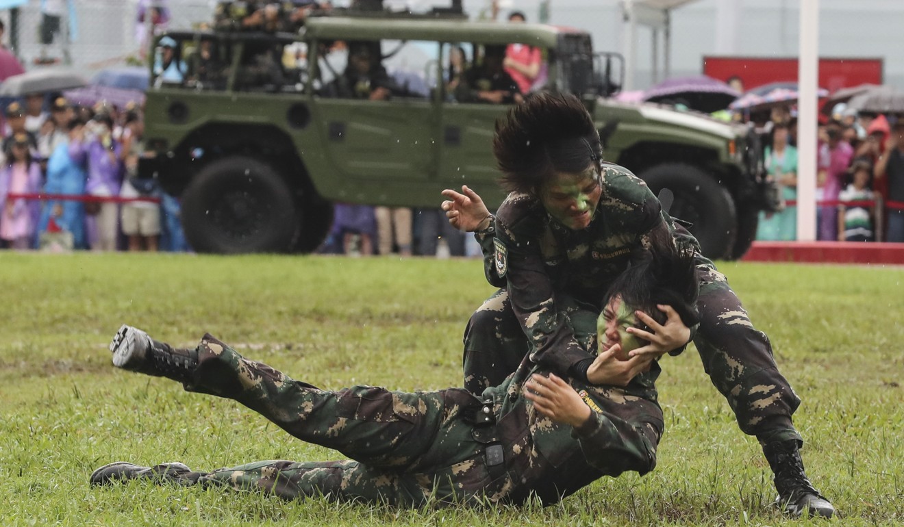 PLA troops go through their paces for the public at their Hong Kong barracks during an open day. Photo: Edward Wong