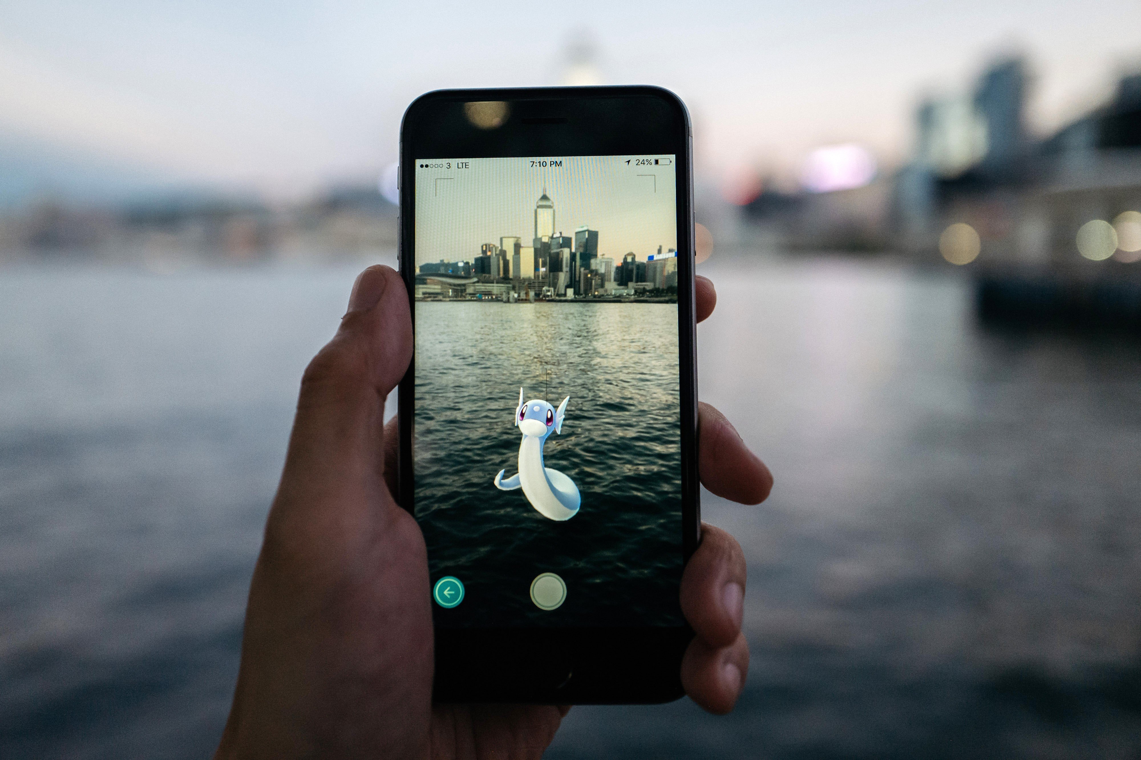 A Hong Kong Pokemon Go player finds a Dratini, a dragon type Pokemon, in Victoria Harbour. Photo: Bloomberg