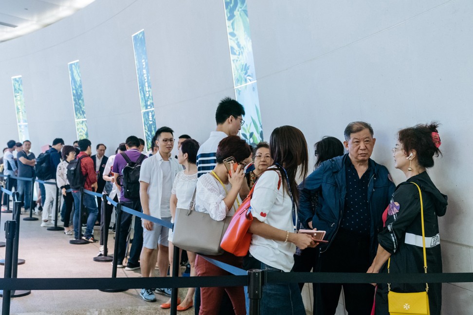 VICTORIA HARBOUR - Buyers waiting in line at the sales office for the Victoria Harbour residential project by Sun Hung Kai Properties in Hong Kong on Sunday