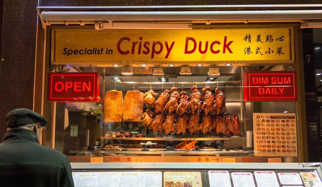Aromatic Chinese crispy duck on display in Chinatown in London.
