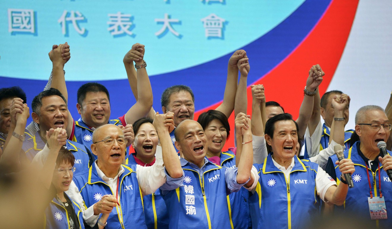 Han Kuo-yu (centre) gestures with party heavyweights including Ma Ying-jeou (second from right) at the Kuomintang congress in Taipei on Sunday. Photo: AFP