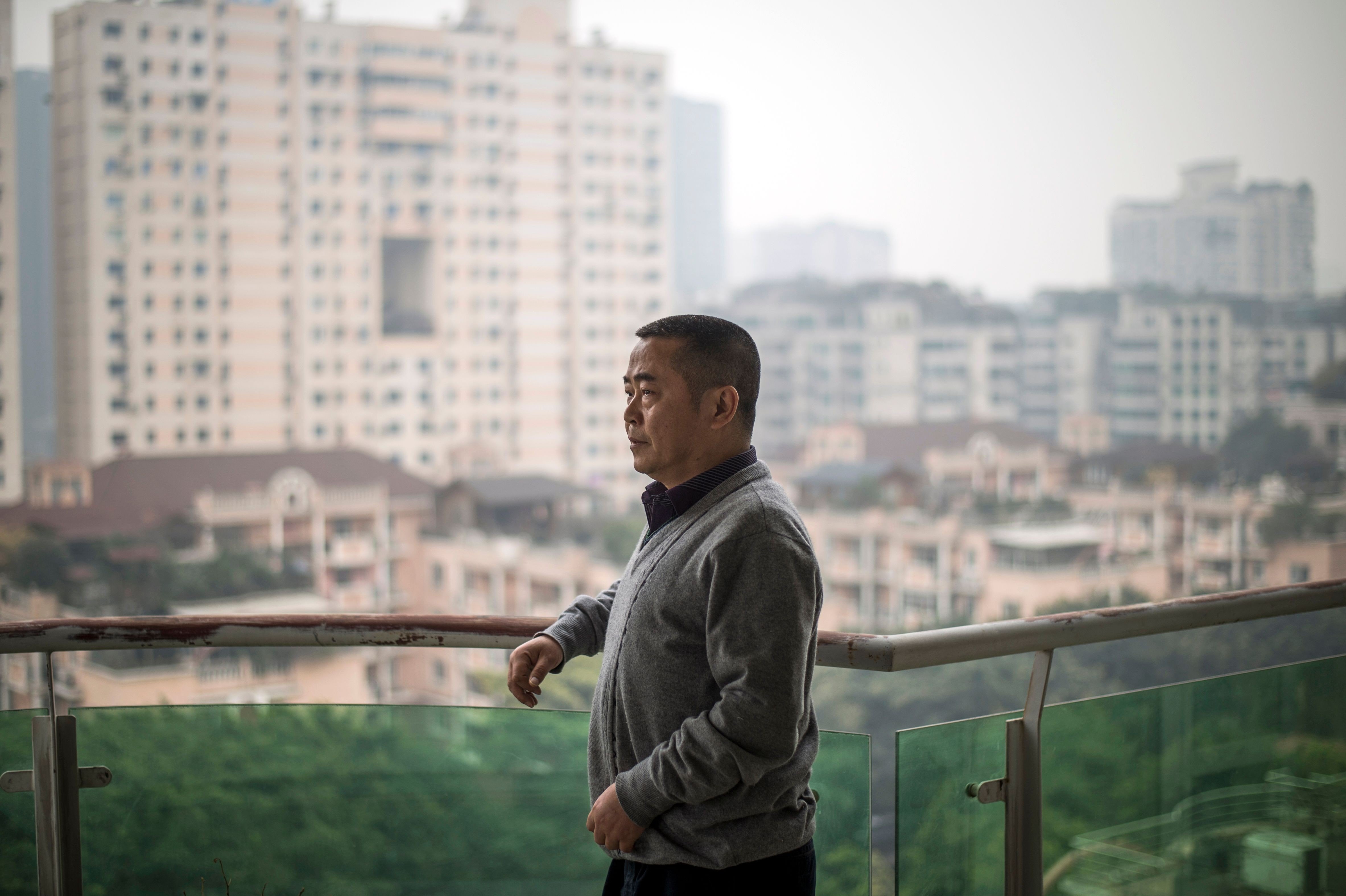 The activist Huang Qi at his home in Chengdu, Sichuan province, in 2015. This week he was sentenced to 12 years in jail, his third prison term. Photo: AFP