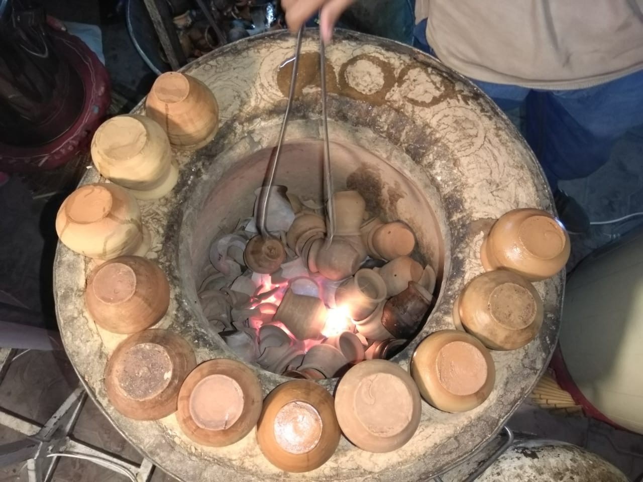 Terracotta mugs baked in a tandoor. Photo: Kaswar Klasra