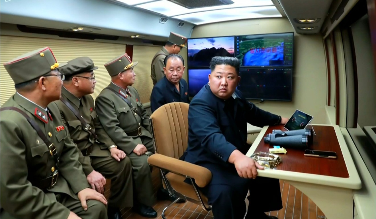 North Korean leader Kim Jong-un seen supervising the launch of a ballistic missile at an unknown location in North Korea. Photo: KCTV/AFP