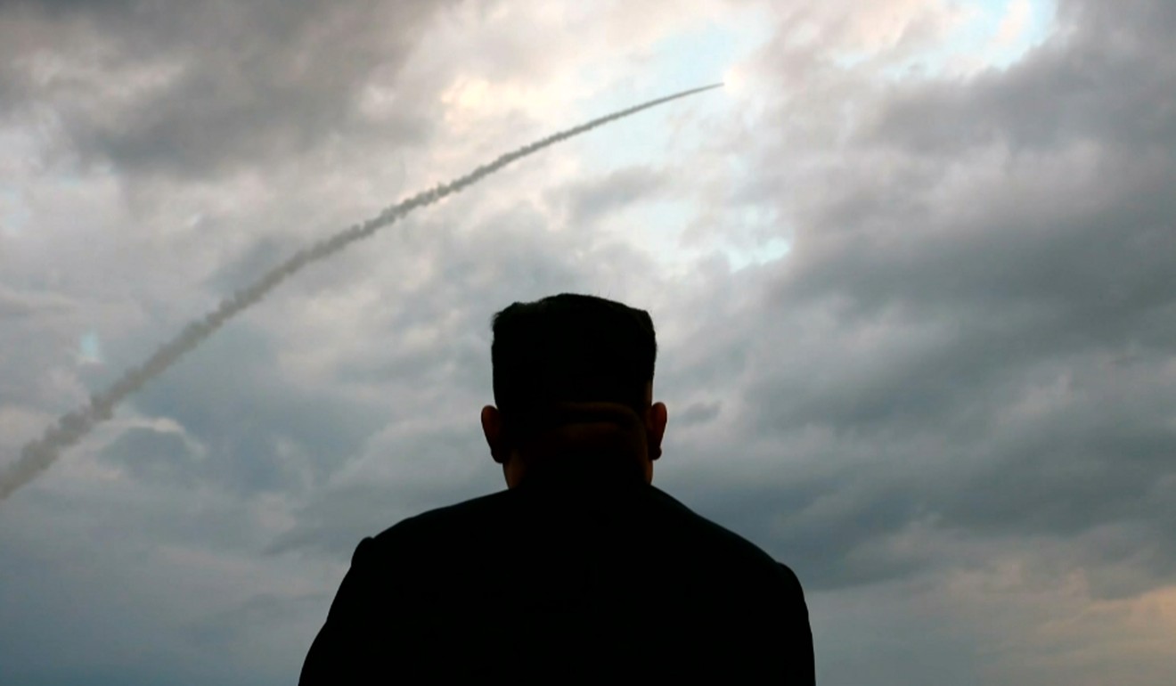 Kim Jong-un watching the launch of a ballistic missile at an unknown location in North Korea on July 31. Photo: KCTV/AFP