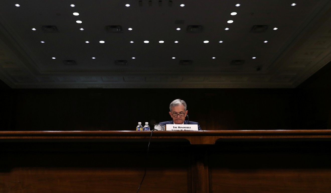 Federal Reserve Board Chairman Jerome Powell testifies before a Senate committee hearing on monetary policy on July 11. Powell has reversed course, raising interest rates, but even this has not spared him Donald Trump’s criticism. Photo: Reuters