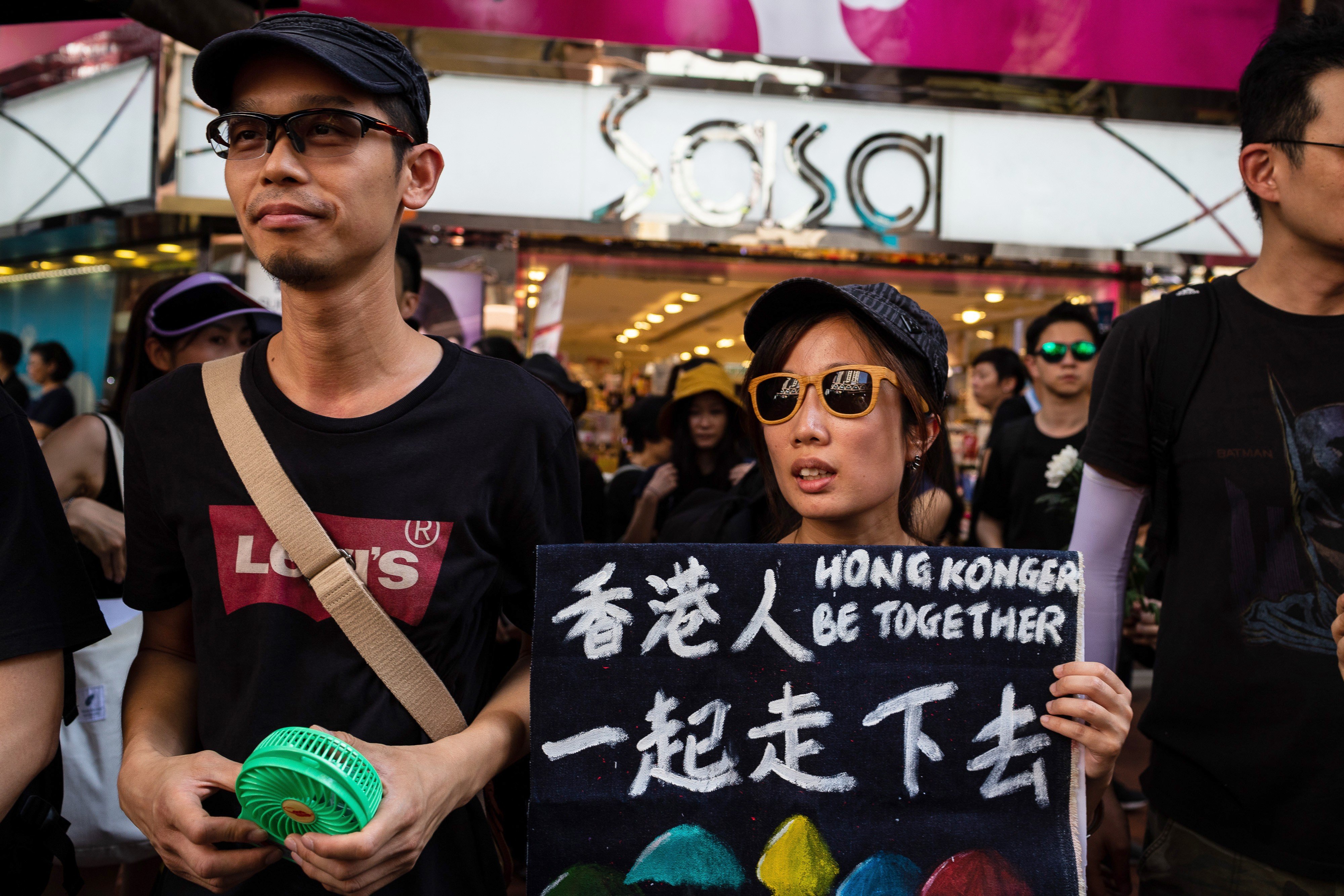 Hong Kong has to save itself and every Hongkonger is in this together – a sentiment expressed by a protester on July 1. Photo: Bloomberg