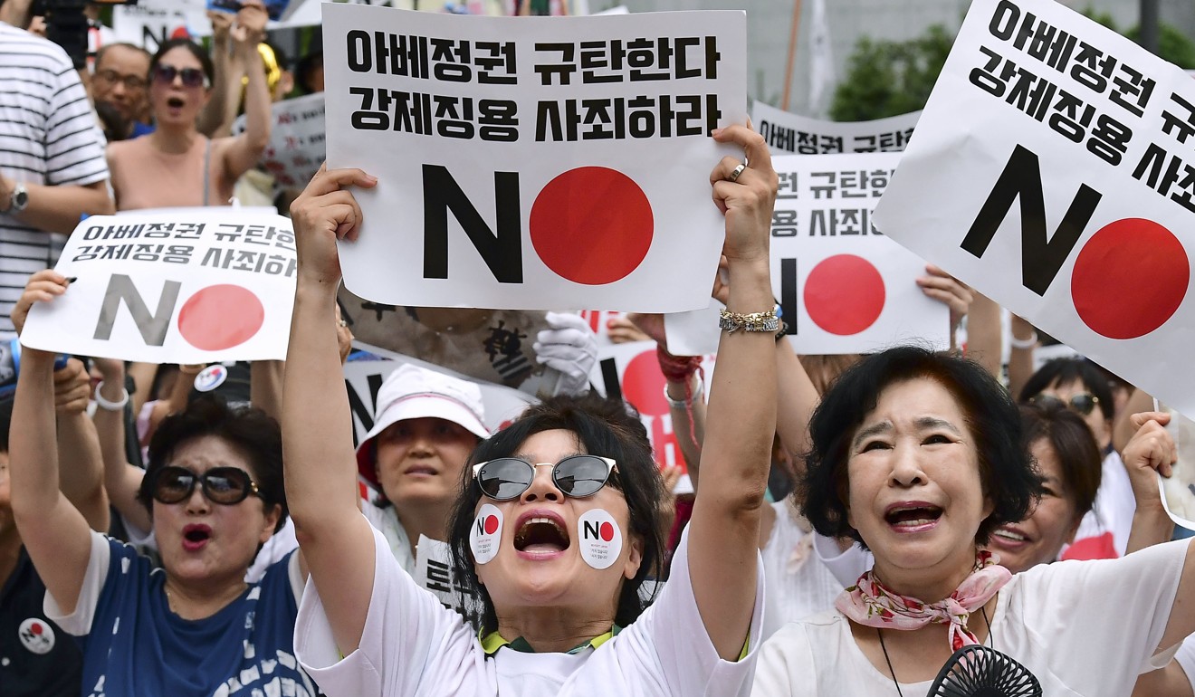 Protesters gather in front of the Japanese Embassy in Seoul on August 3. Photo: Kyodo