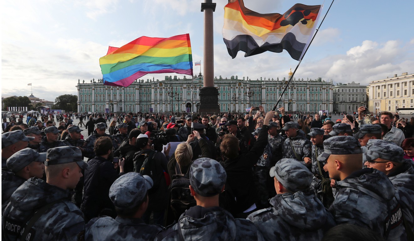 Law enforcement officers block participants at an LGBT rally in Saint Petersburg on Saturday. Photo: Reuters