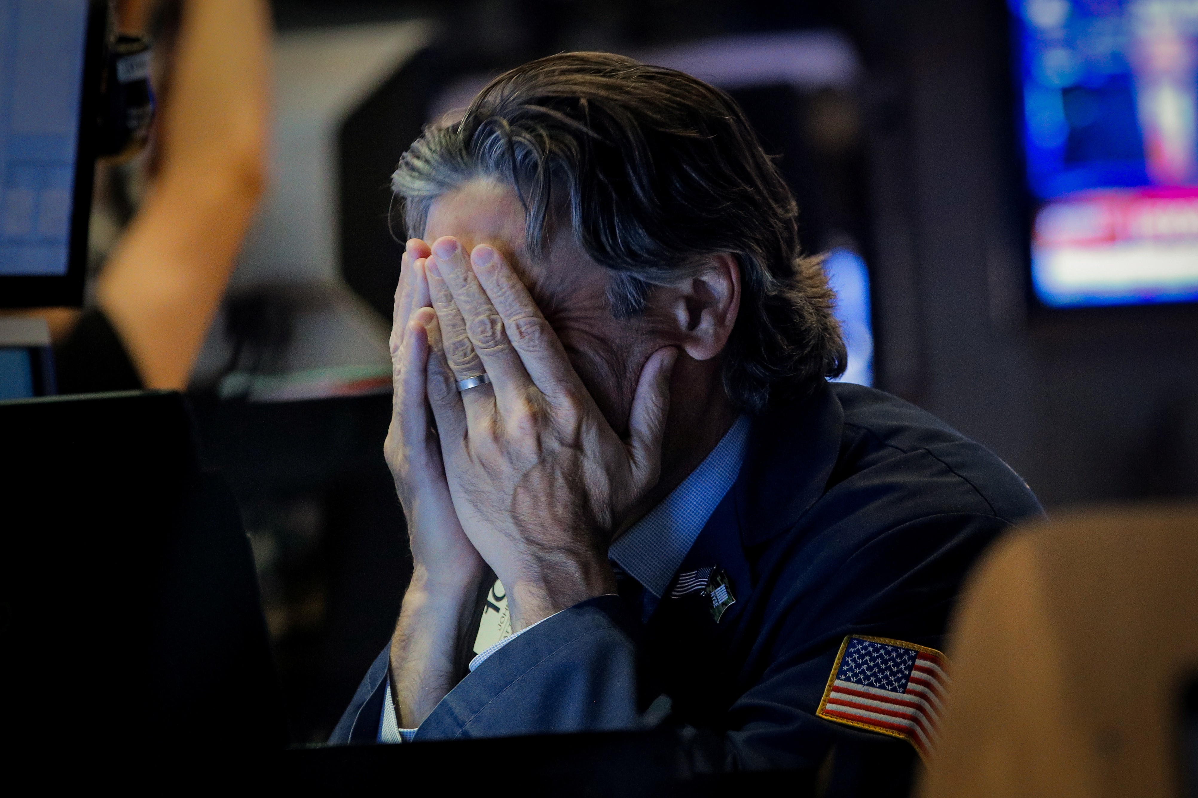 A trader reacts on the floor at the New York Stock Exchange on Monday. Photo: Reuters