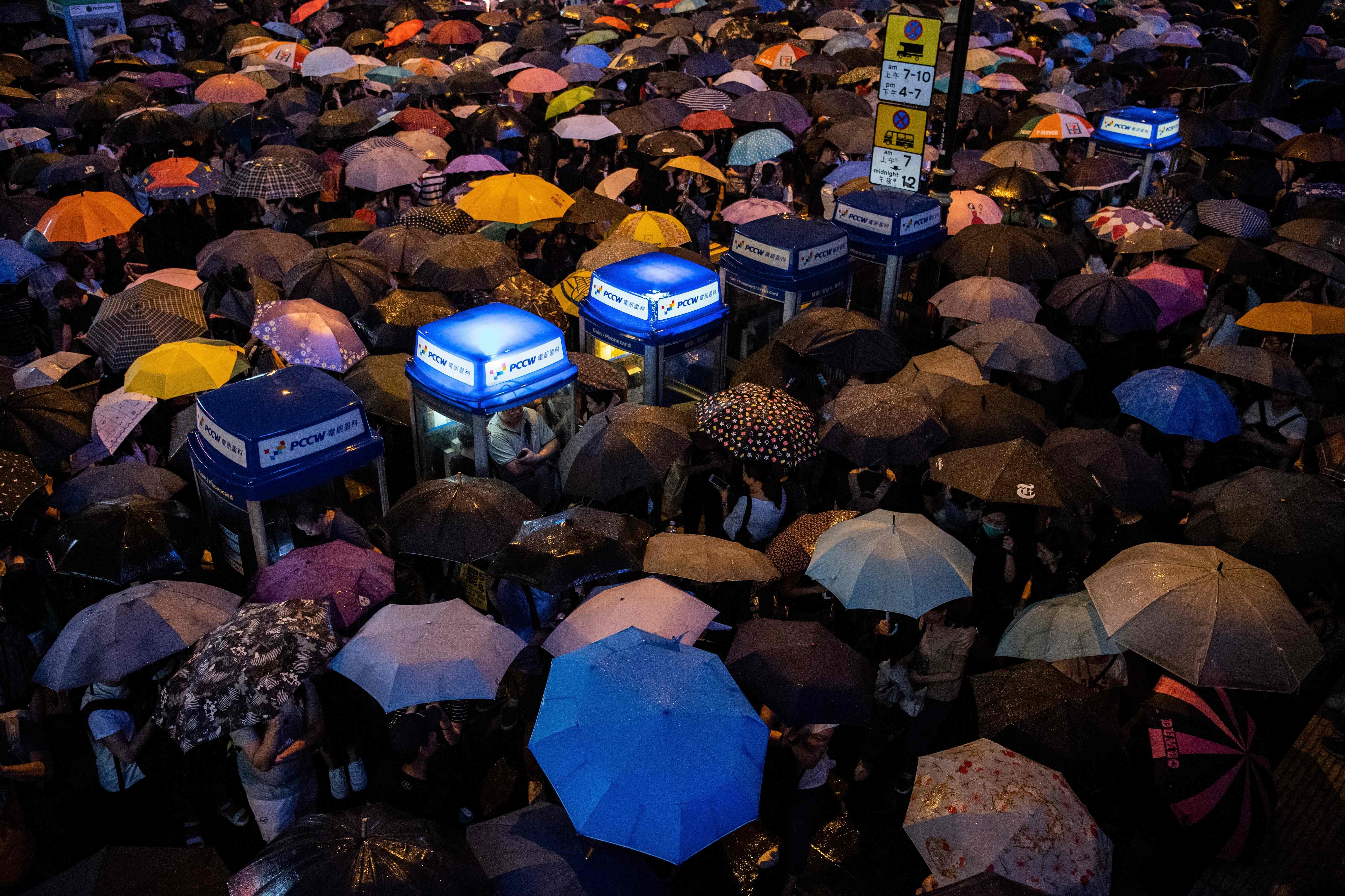 People attend a protest held by civil servants in Central district on August 2. Photo: AFP