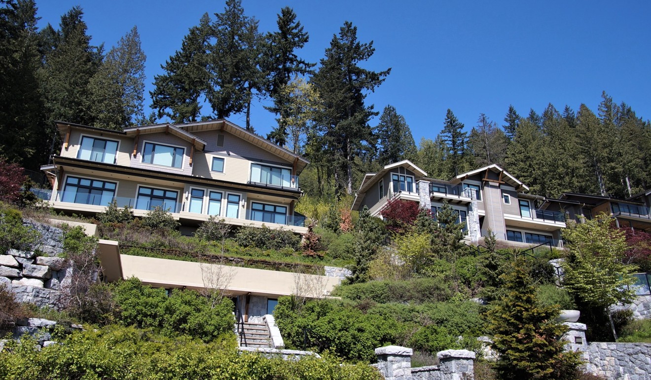 These neighbouring houses in Vancouver’s British Properties, each worth C$7 million (US$5.2 million), were once intended as homes for tycoon Li Jianhua and daughter Li Xiaoqi. The pair are now battling over them in a Canadian court. Photo: Ian Young