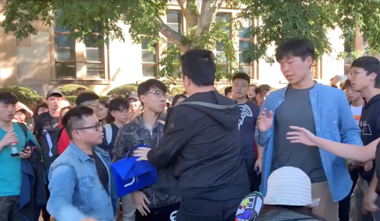 Hong Kong and mainland Chinese students clash during a pro-democracy protest at the University of Queensland in Australia. Photo: Twitter