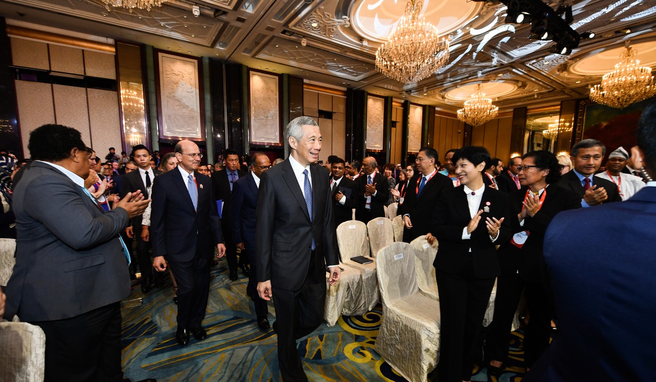 Delegates attend the signing ceremony of the Singapore Convention. Photo: Handout