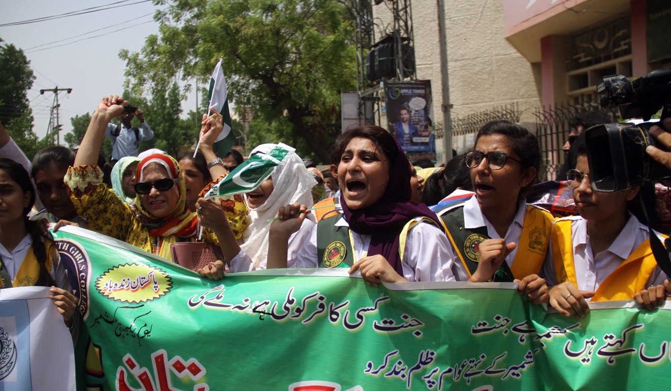 Pakistani schoolgirls at a protest in Muzaffarabad against India’s Kashmir move. Photo: EPA