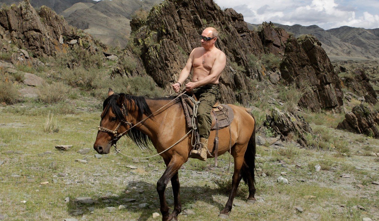 Vladimir Putin, the Russia’s prime minister in 2009, rides a horse while on holiday in southern Siberia. File photo: AFP