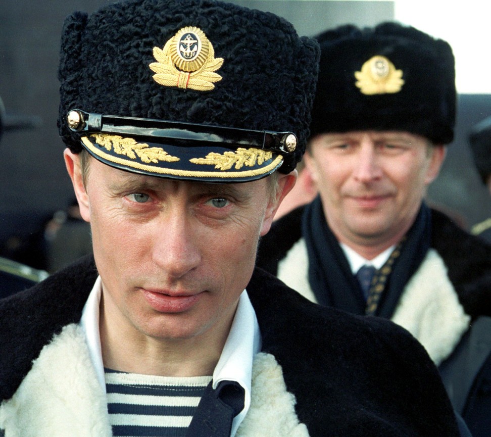 Russian President Vladimir Putin wears a navy officer's uniform in 2000. File photo: AFP