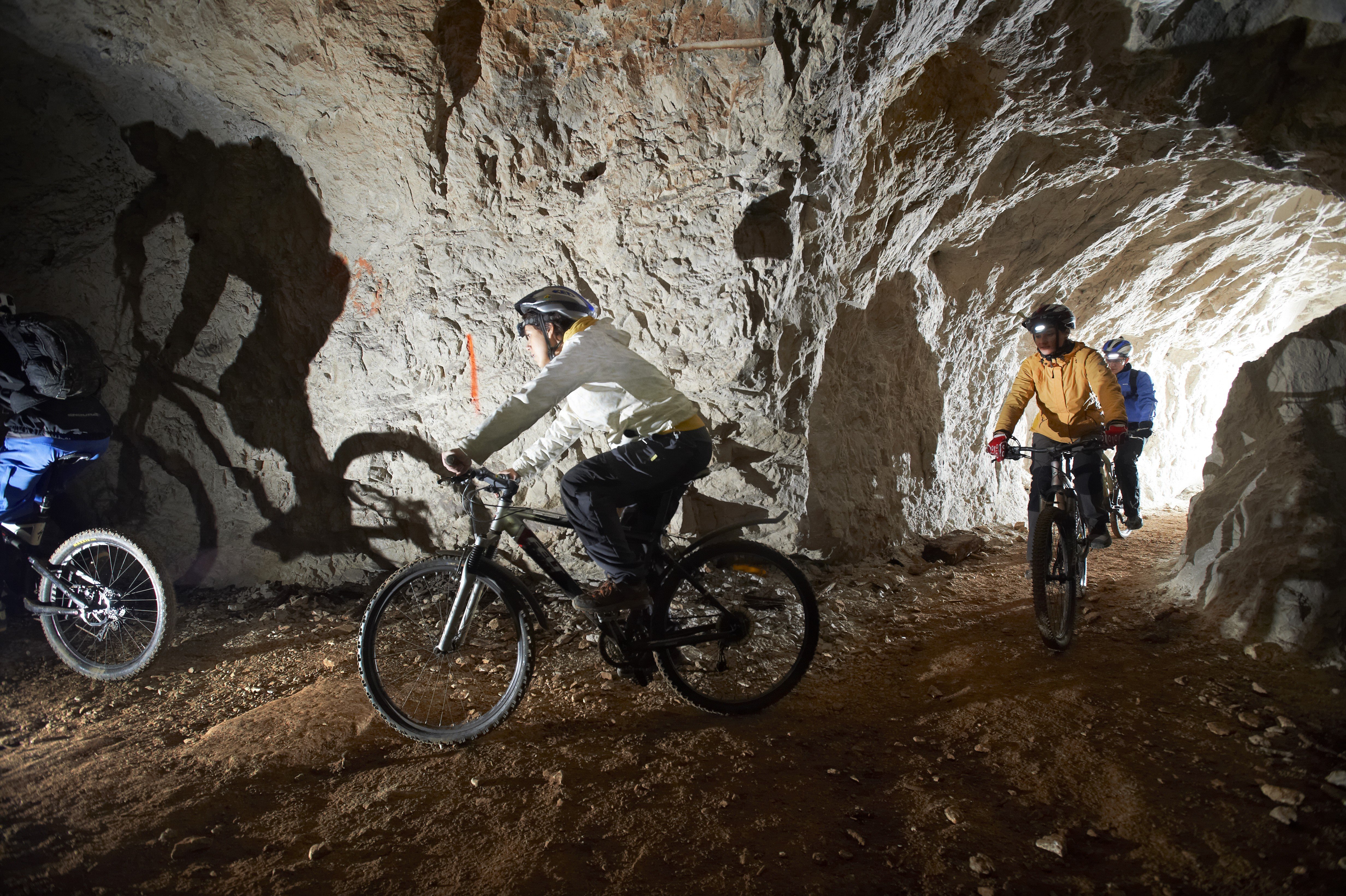 Underground cave biking in Slovenia is a popular adventure.