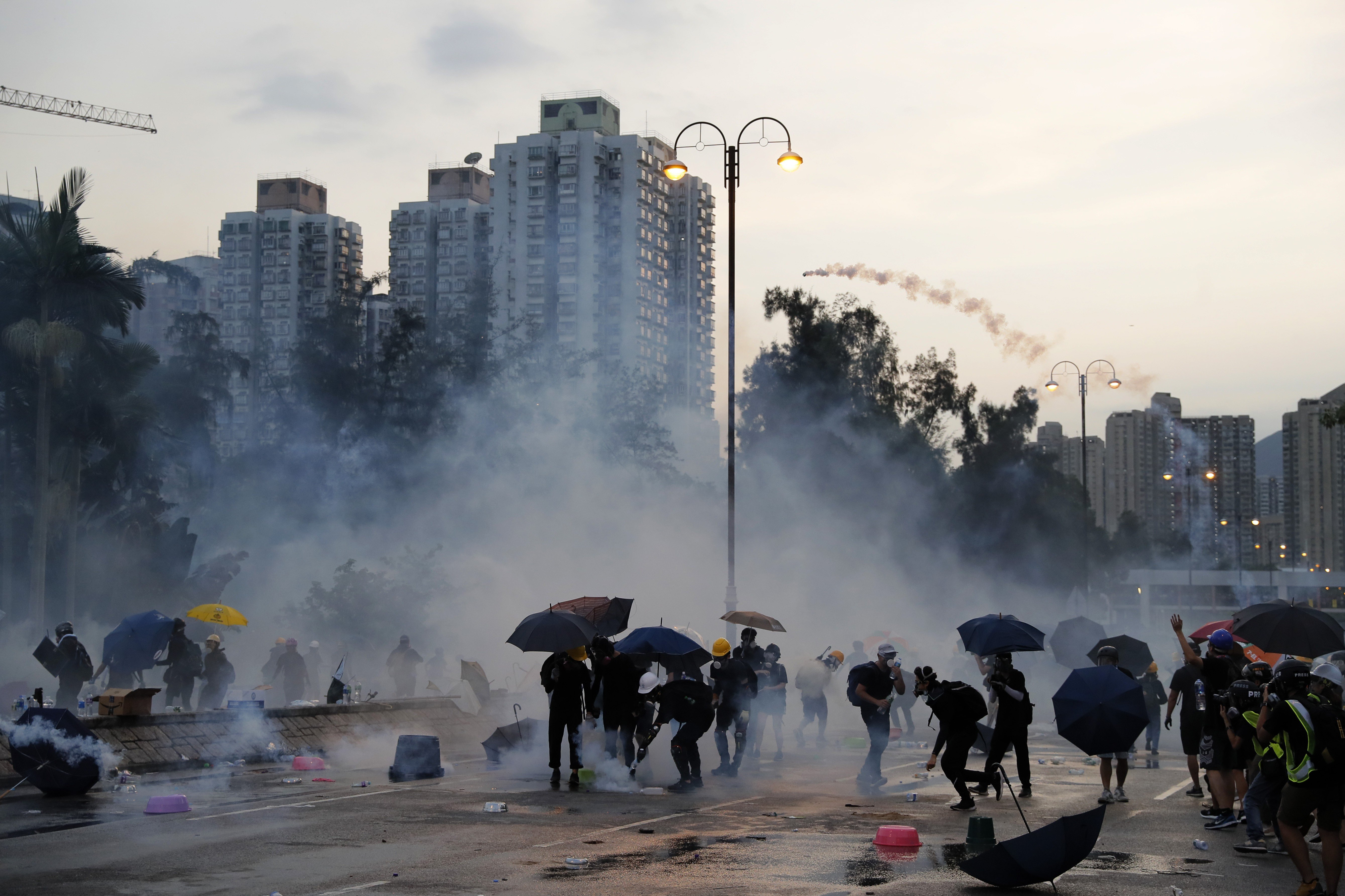 Protesters amid tear gas in Hong Kong. Photo: AP
