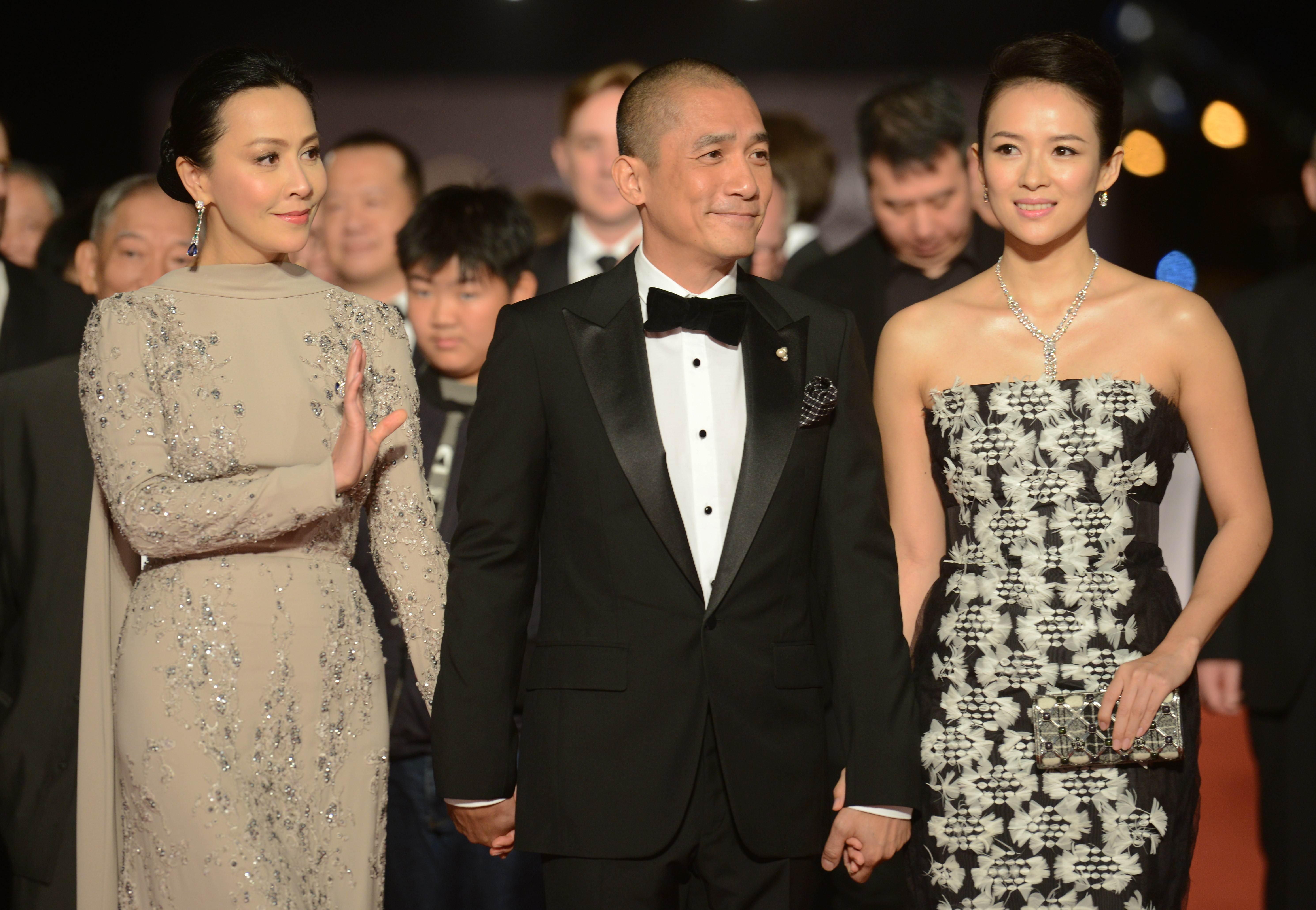 Hong Kong’s Carina Lau (left) and Tony Leung Chiu-wai, and Chinese actress Zhang Ziyi arrive for the 2013 Golden Horse Awards ceremony. Hong Kong and Chinese stars will be absent this year. Photo: AFP