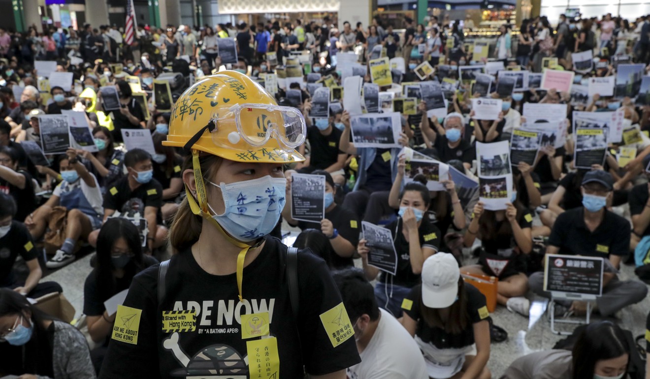 Protesters gather at Hong Kong airport for a sit-in scheduled to last up to three days. Photo: Edmond So