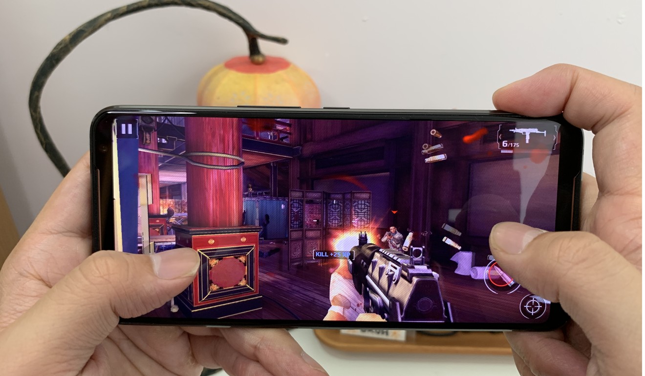 The Asus ROG Phone 2 has two USB-C ports (one on the bottom, one on the side) so users can charge the phone and play games at the same time without the cable getting in the way. Photo: Ben Sin