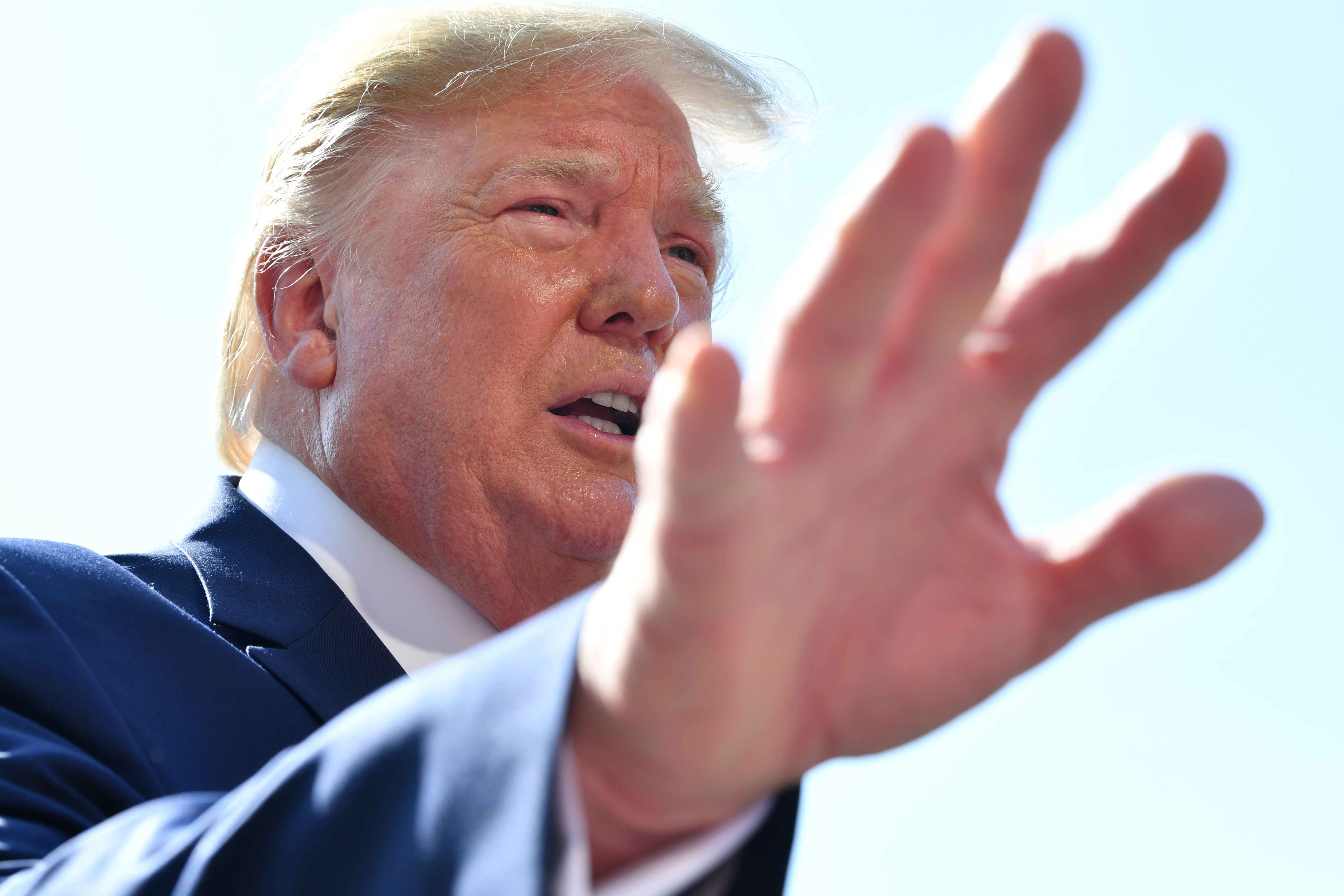 US President Donald Trump speaking to reporters before departing Washington on Friday. Photo: AFP