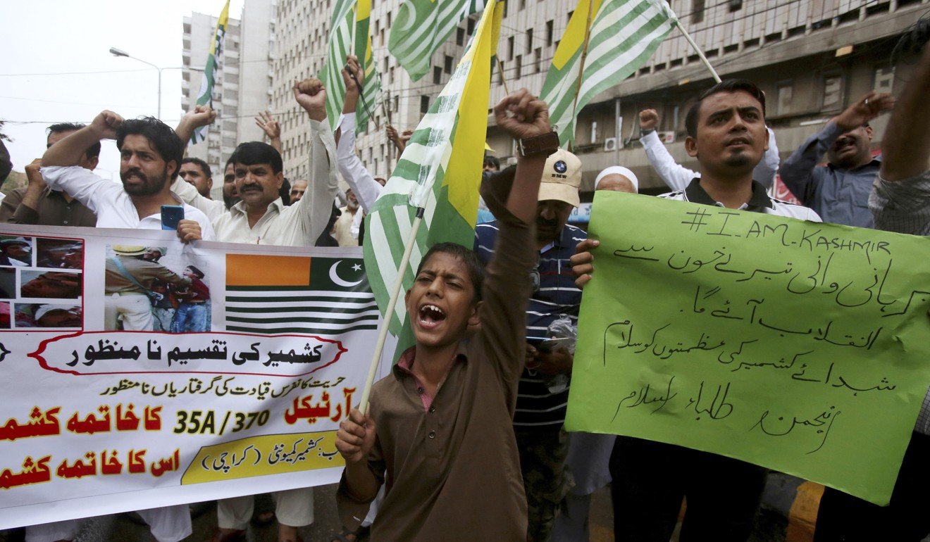 Supporters of Anjum-e-Tulba Islam during a demonstration to condemn India. Photo: AP