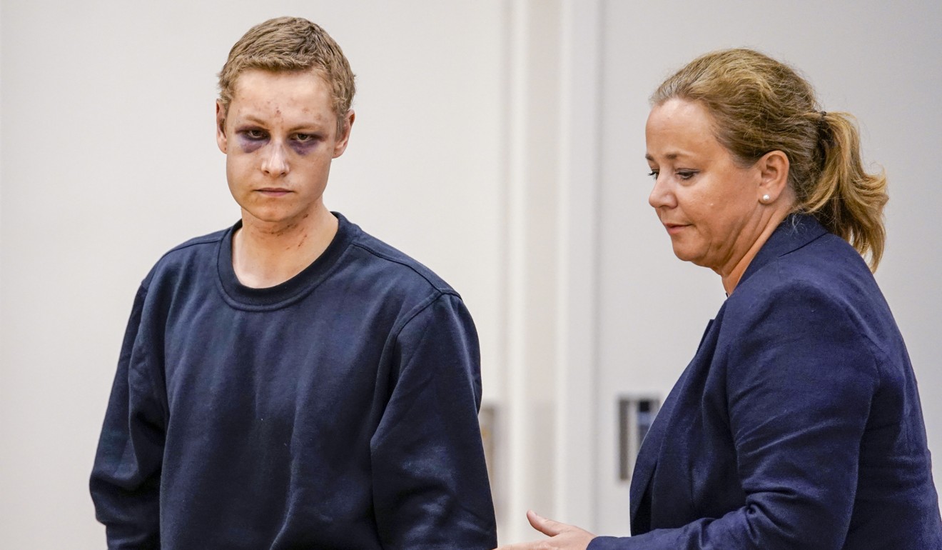 Suspected gunman Philip Manshaus (left) and his lawyer, Unni Fries, attend a court hearing in Oslo on Monday. Photo: Cornelius Poppen, NTB scanpix via AP