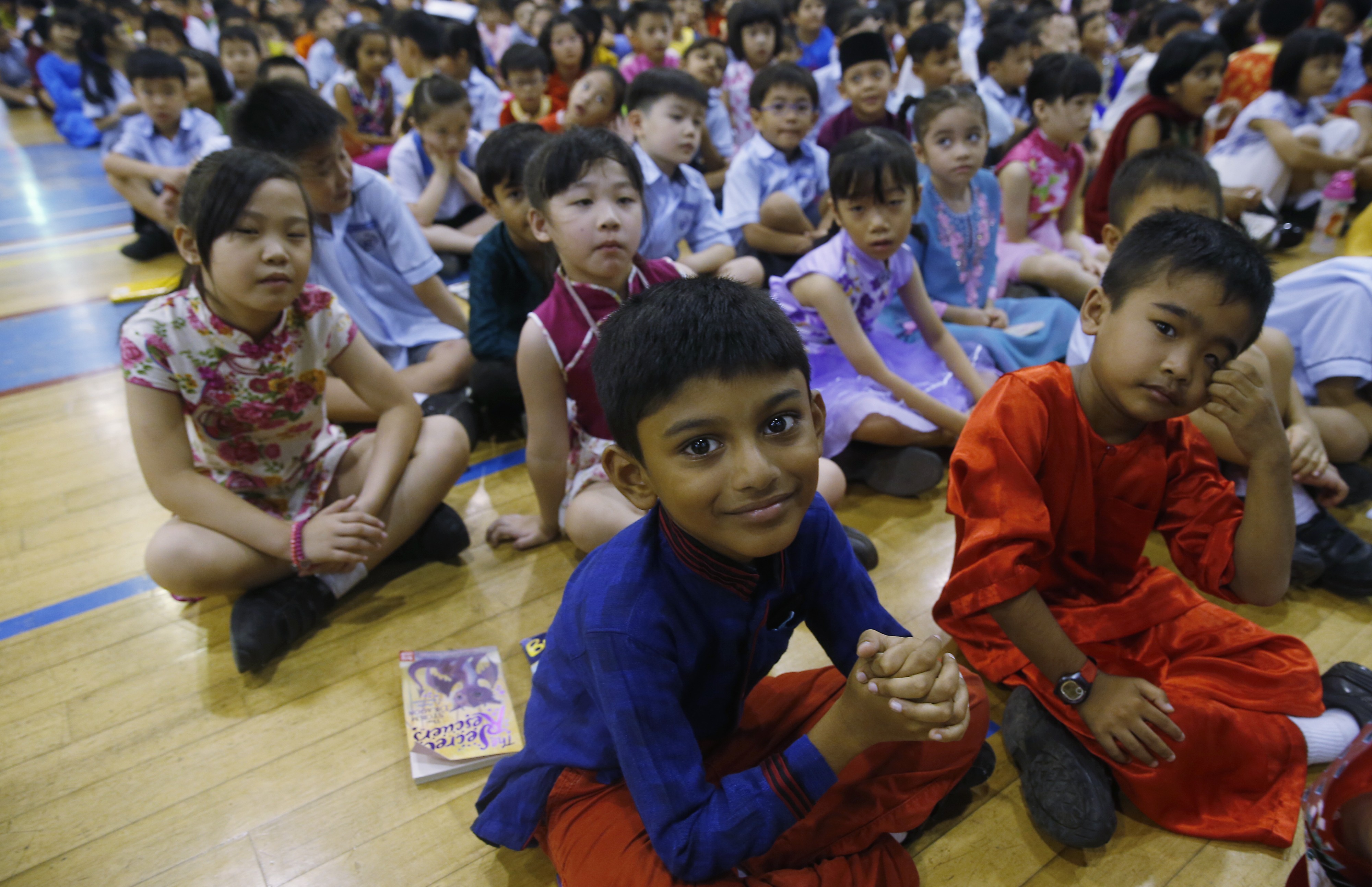 Through measures like annual Racial Harmony Day celebrations in schools, Singapore is careful to promote peace between ethnic groups. Photo: Kevin Lim