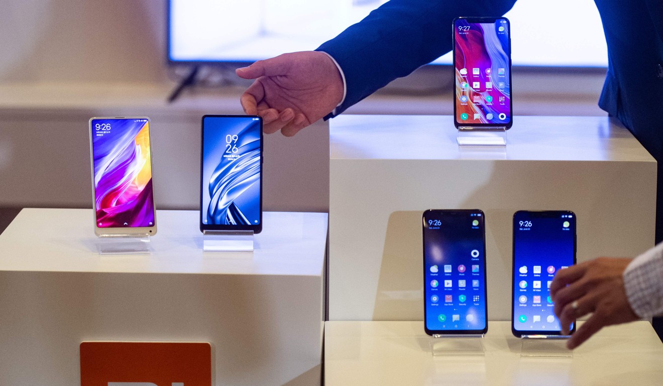 Chinese brands such as Xiaomi are aggressively pushing sales overseas. Photo: AFP/Philip Fong