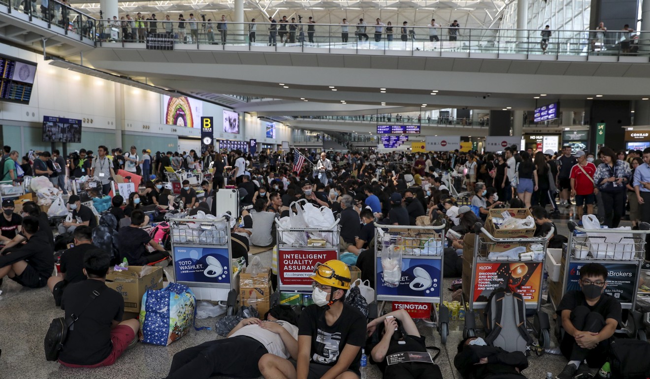 Protesters have returned to Hong Kong airport on Tuesday afternoon, the day after a demonstration grounded all flights. Photo: Sam Tsang