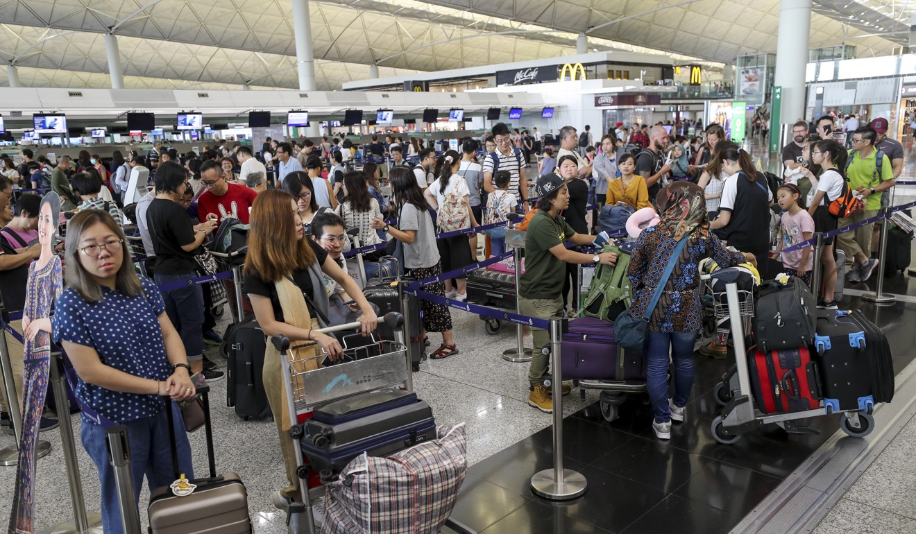 Airlines are playing catch-up, but hundreds of flights in and out of the Lantau hub will not go ahead on Tuesday as scheduled. Photo: Edward Wong