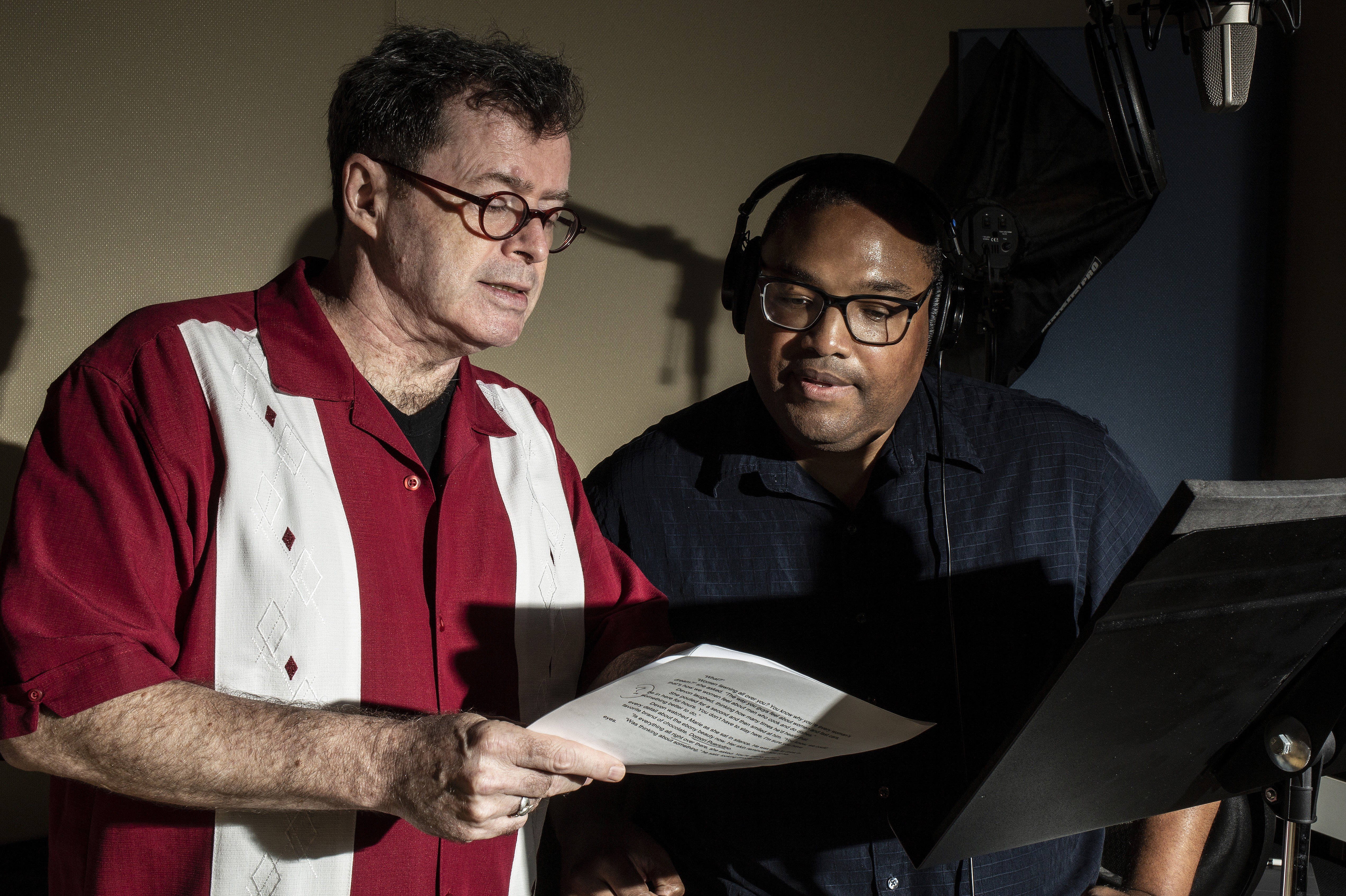 Voice actor and instructor Johnny Heller (left) offers tips to voice actor David McKeel during a recording session at Edge Studio in New York. Photo: The Washington Post/Bryan Anselm
