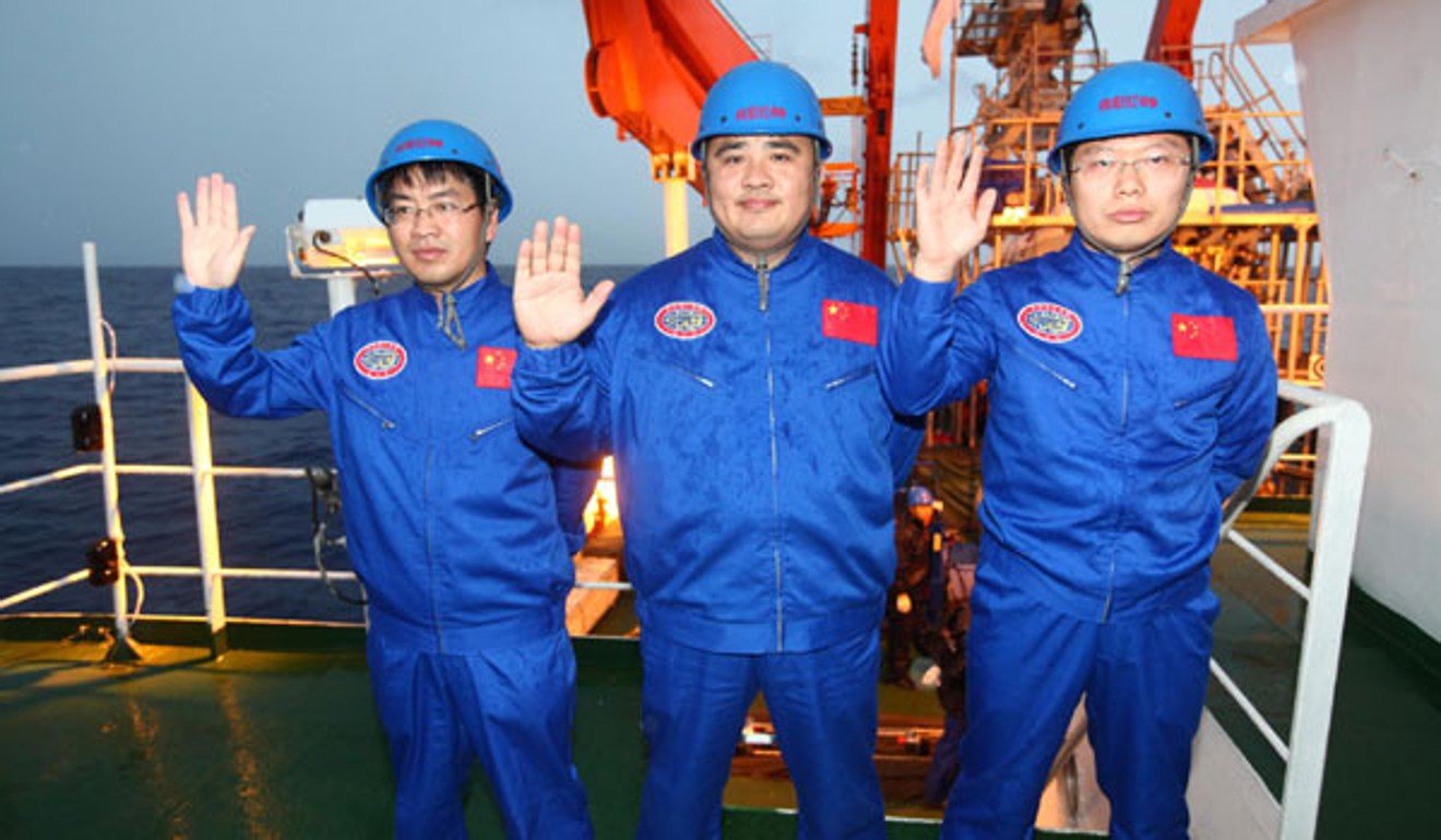 Professor Liu Kaizhou (left) with colleagues Ye Cong and Yang Bo, was instrumental in the success of China’s Jiaolong manned submersible. Photo: Xinhua