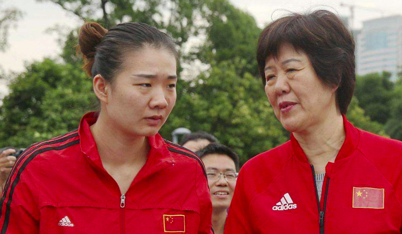 Yang Fangxu and her coach Lang Ping. Photo: Handout