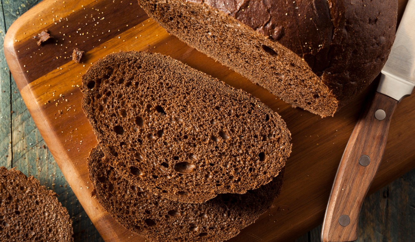 Home-made organic pumpernickel rye bread enjoyed in the Nordic diet. Photo: Alamy