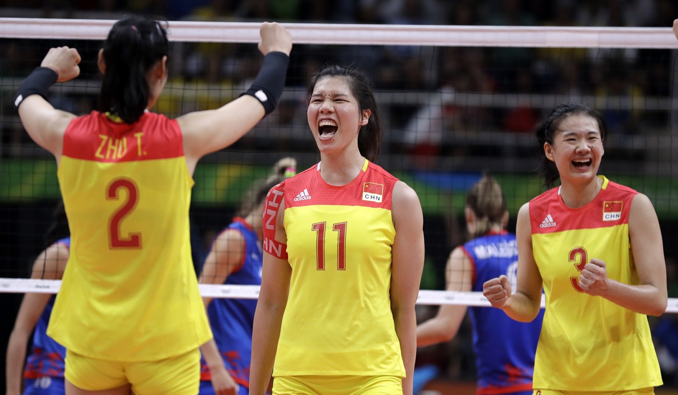 Yang Fangxu (right) celebrates during China’s gold medal volleyball match against Serbia at the 2016 Olympics in Rio. Photo: AP