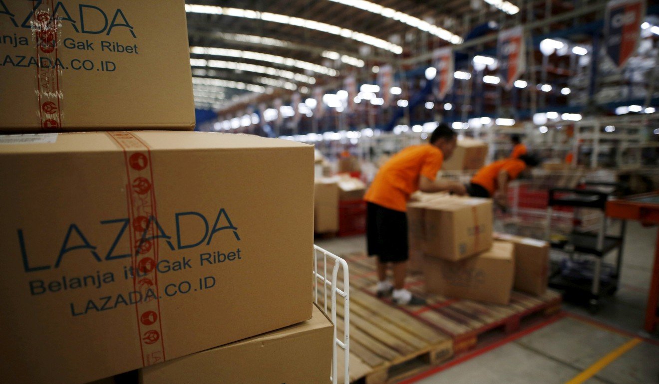 Employees at online retailer Lazada fill orders at the company’s warehouse in Jakarta. Photo: Reuters