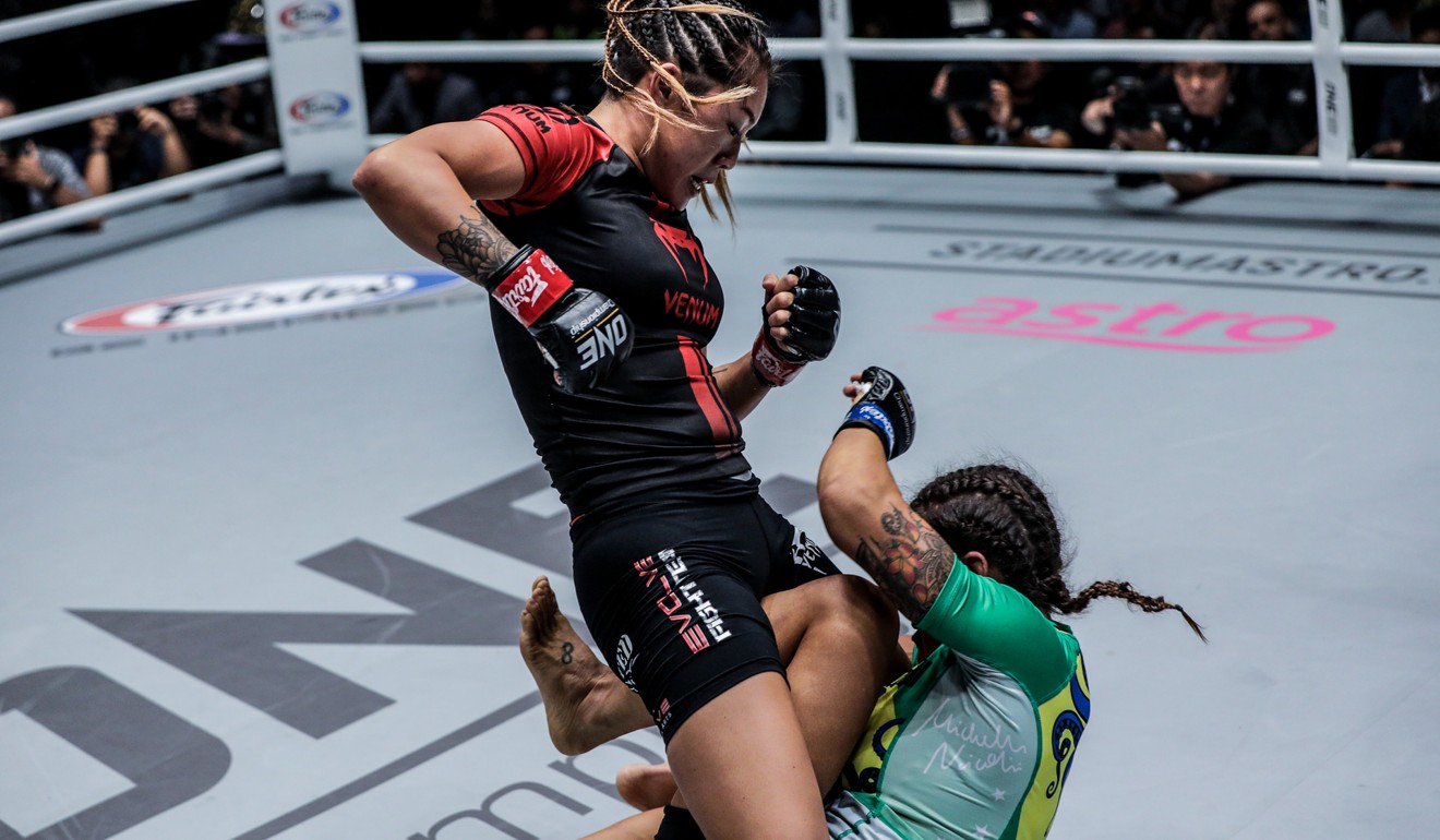 Angela Lee tries to hit Michelle Nicolini on the ground in Kuala Lumpur. Photo: One Championship