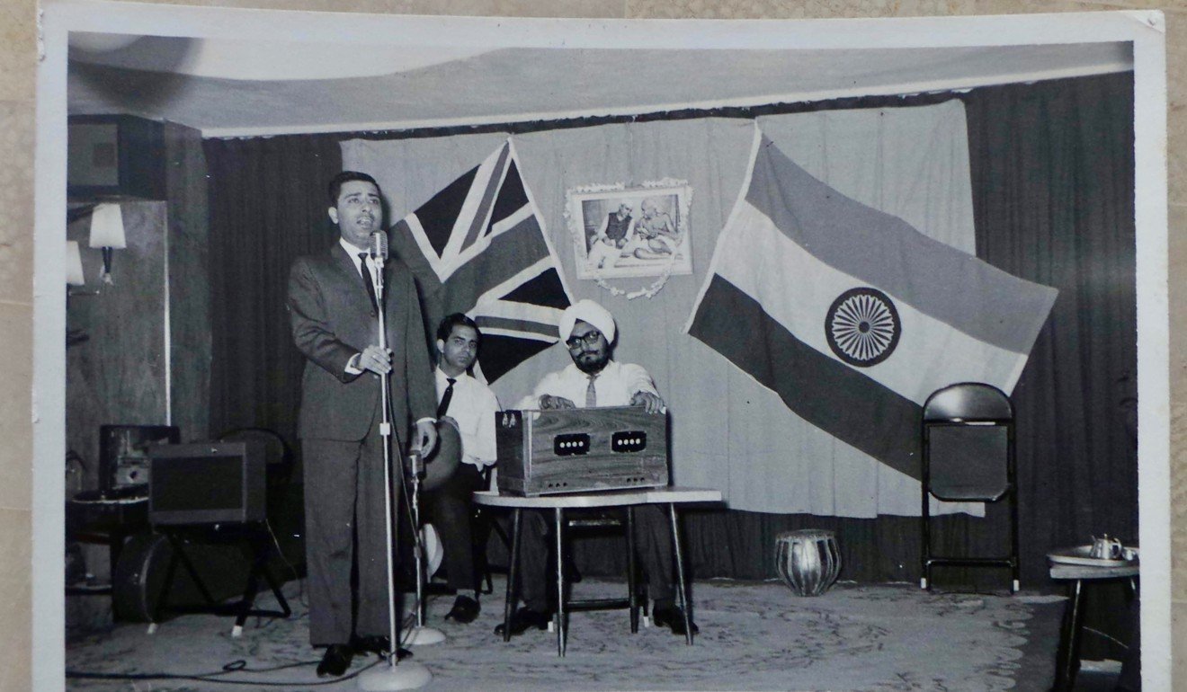 Daswani sings the national anthem on Independence Day in 1961.