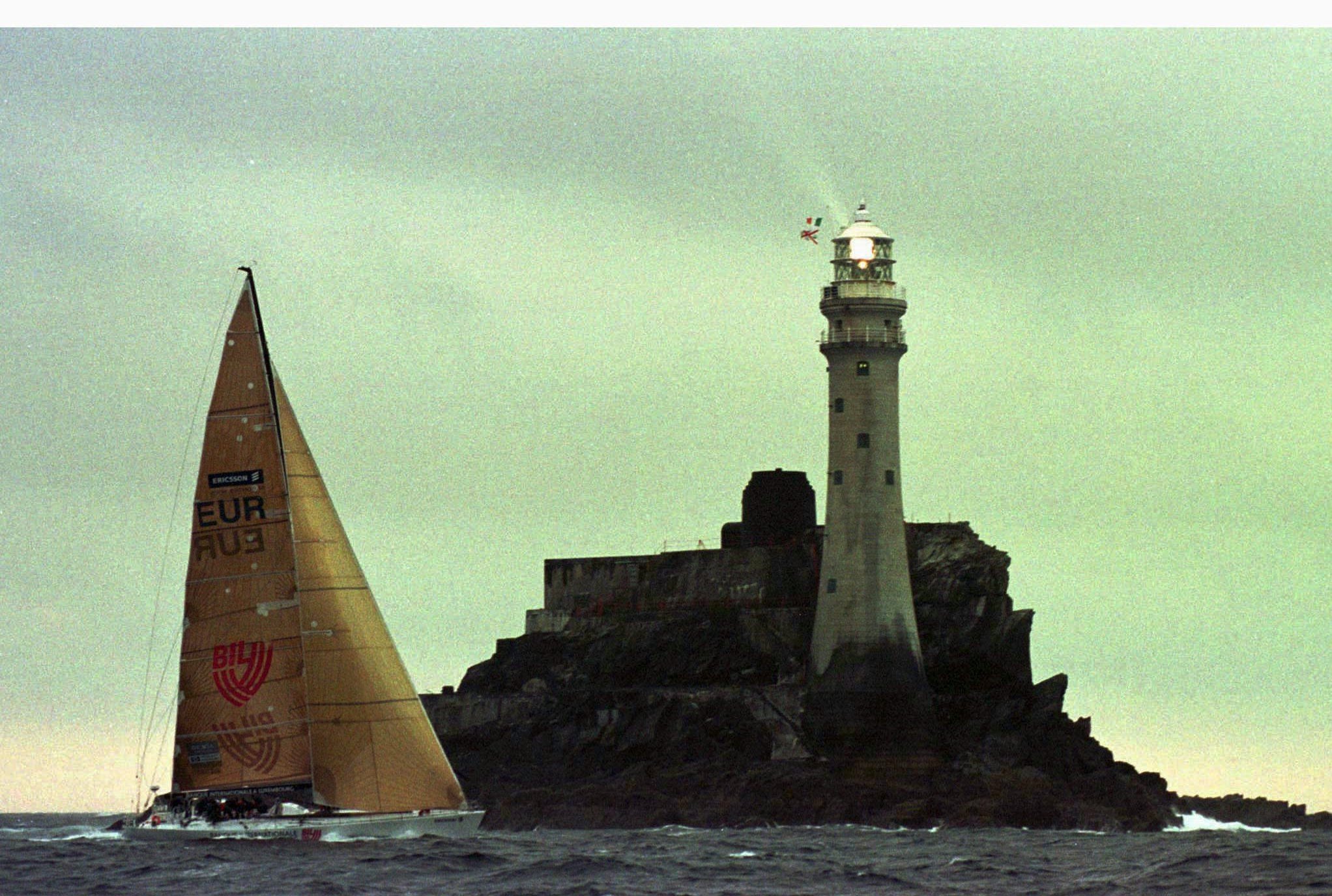 The New Zealand owned yacht 'Bil' rounds the Fastnet lighthouse, the scene of a violent storm in 1979. Photo: Reuters