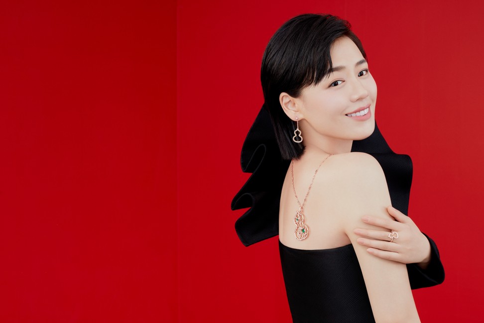 Chinese actress Sandra Ma wears Qeelin’s limited-edition Wulu Bamboo Lace necklace, which marries 18-carat rose gold with diamonds and emerald