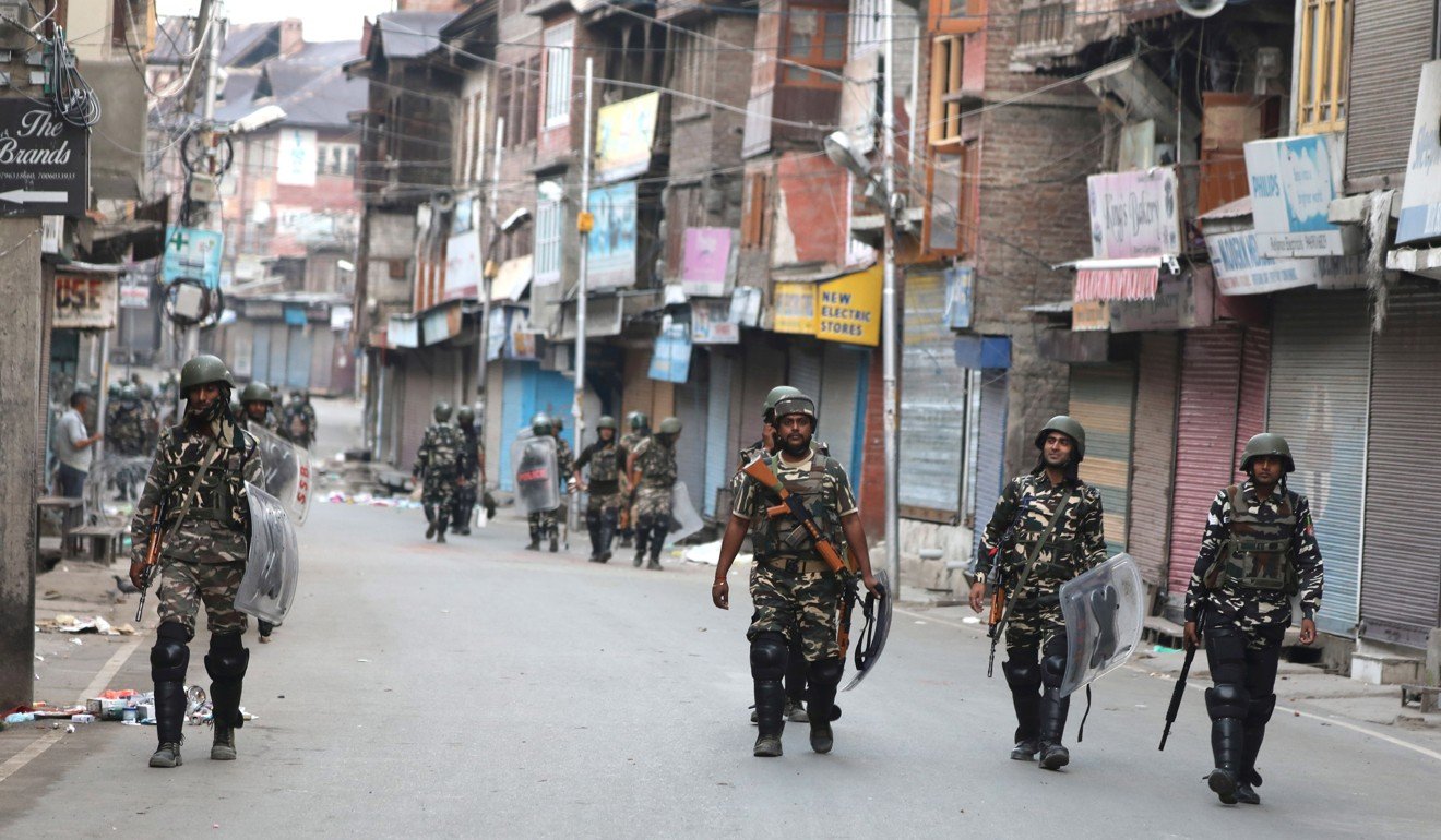 Indian paramilitary soldiers on patrol in Kashmir. Photo: EPA