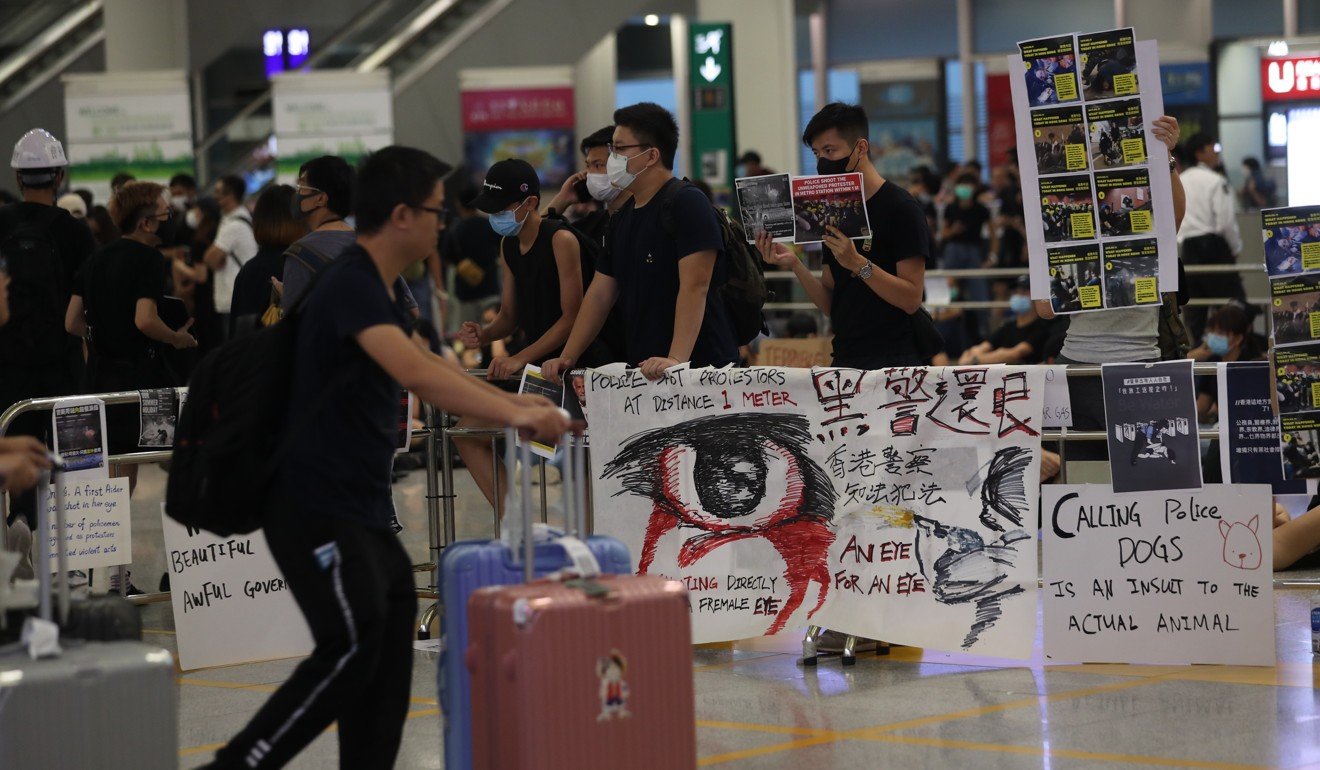 Protesters at the arrival hall of Hong Kong International Airport. Photo: Sam Tsang