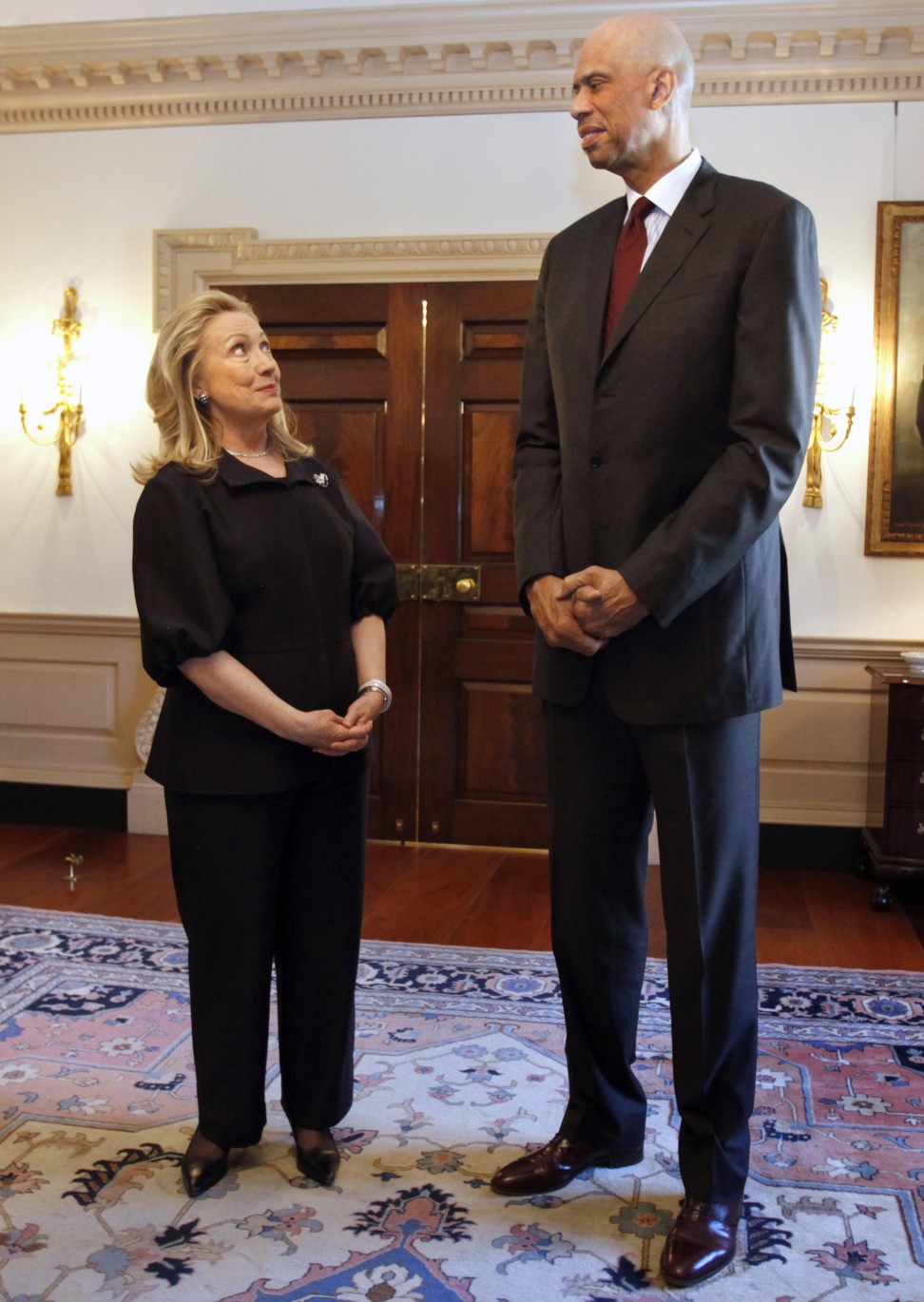 Hillary Clinton with global cultural ambassador and former NBA basketball star Kareem Abdul-Jabbar in January 2012 at the State Department in Washington. Photo: AP