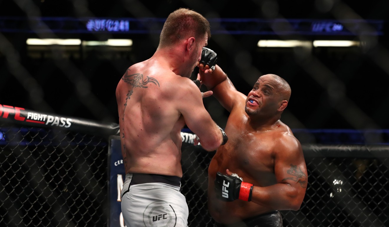 Daniel Cormier throws a punch at Stipe Miocic in the second round.
