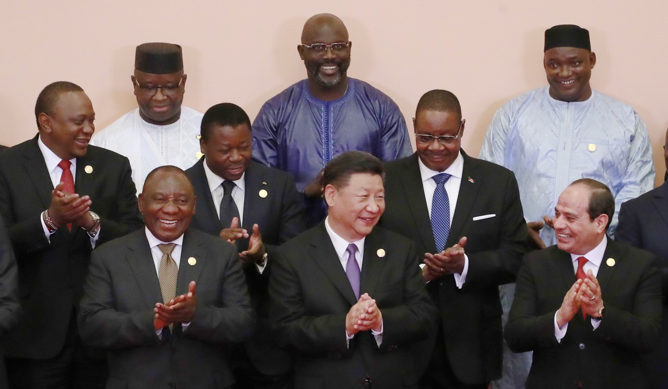 Chinese President Xi Jinping attends a group photo session with African leaders during the Forum on China-Africa Cooperation in Beijing last year. Photo: AP
